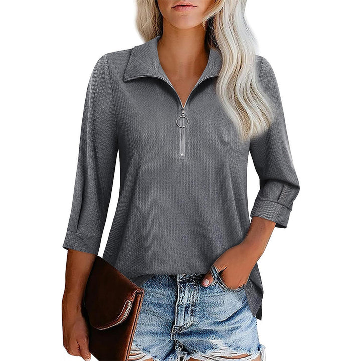 Women's casual blouse with zip collar, three-quarter sleeves, and flared hem Mune Fashion