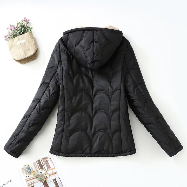 Ladies' quilted hooded jacket with teddy lining, full zipper and side pockets Mune Fashion