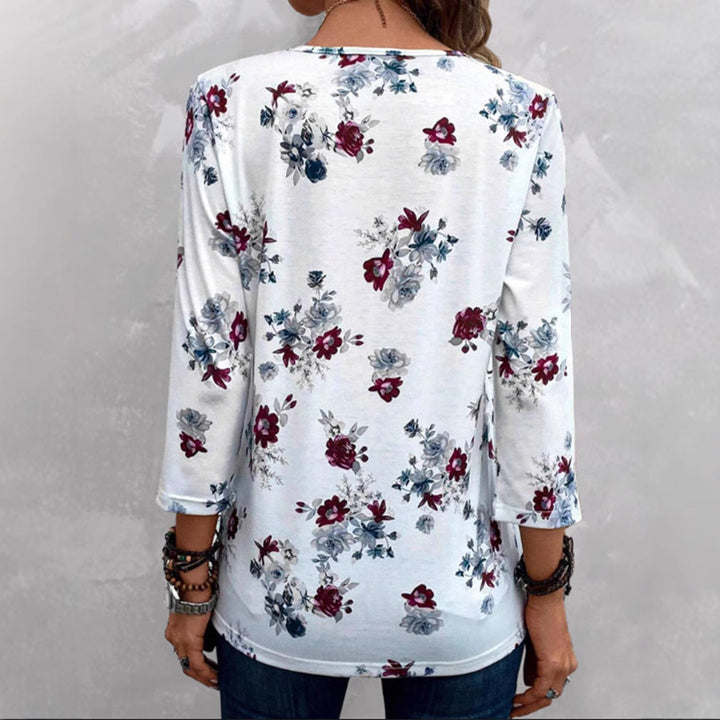 Women's floral tunic blouse with pleats and decorative button placket Mune Fashion