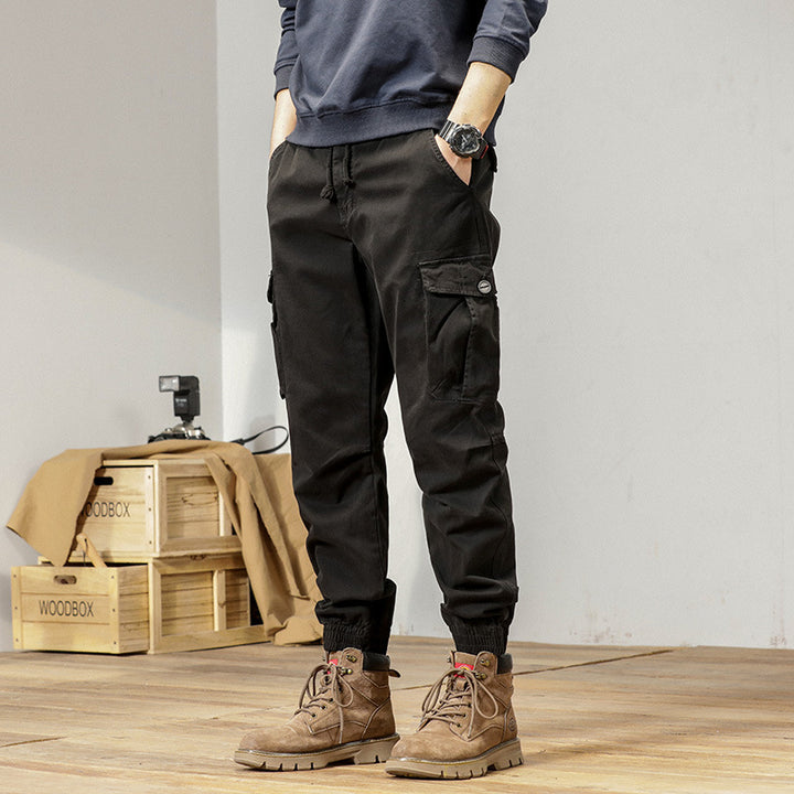 Men's Tapered Cargo Jogger made of sturdy twill with drawstring waistband, flap pockets and ribbed ankles Mune Fashion
