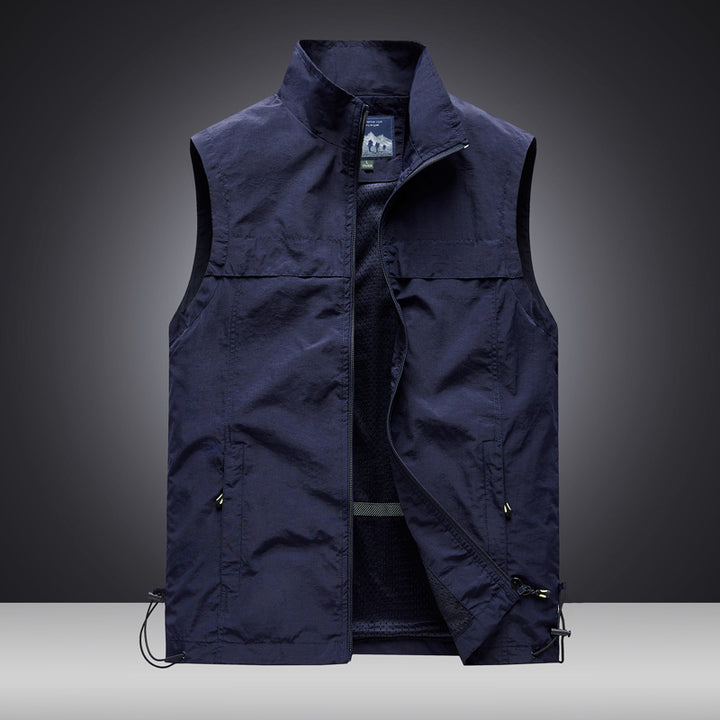 Men's light wind and water-repellent utility vest with stand-up collar, mesh lining & adjustable hem Mune Fashion