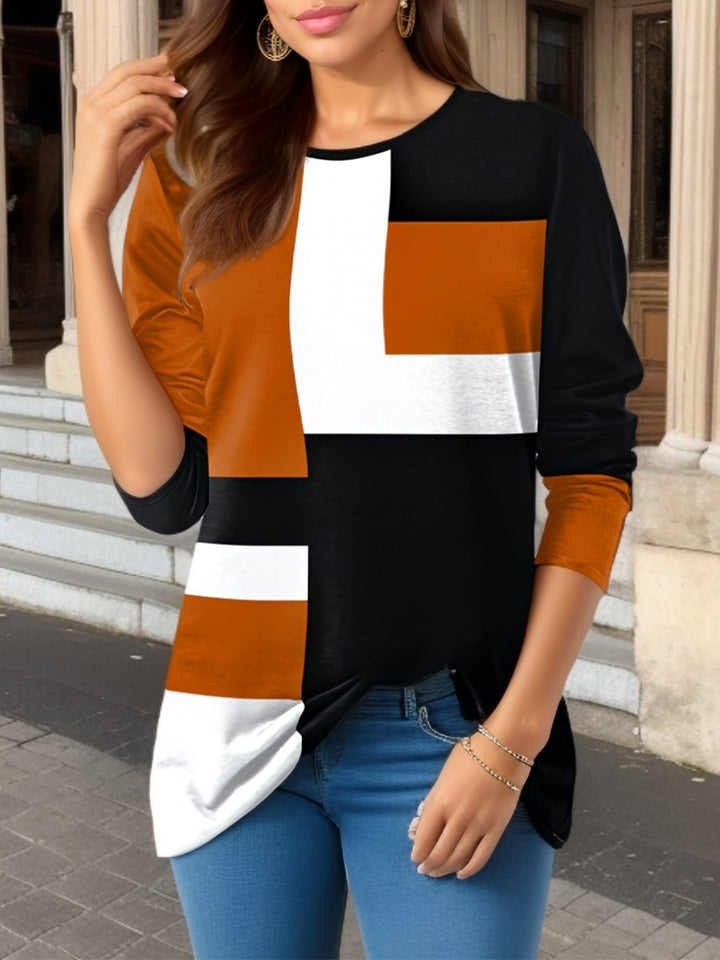 Women's geometric color block long sleeve tunic top with round neck and asymmetrical hem Mune Fashion