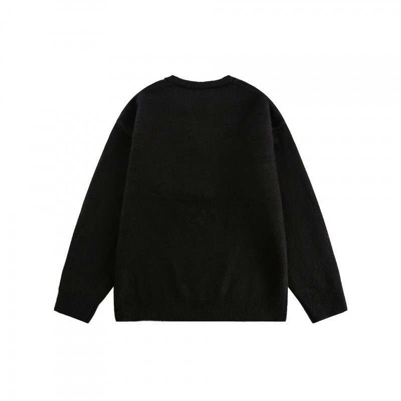 Unisex Boxy fine knit pullover with half Henley opening, round neck and ribbed finishes Mune Fashion