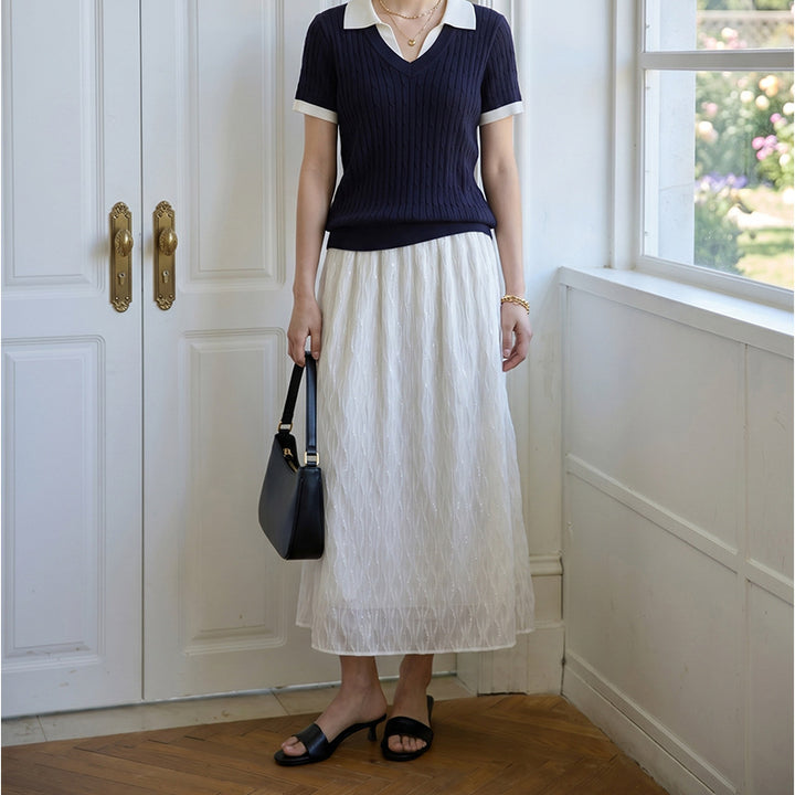 Women's embroidered midi maxi skirt with fine glitter mesh and elastic comfort waistband.