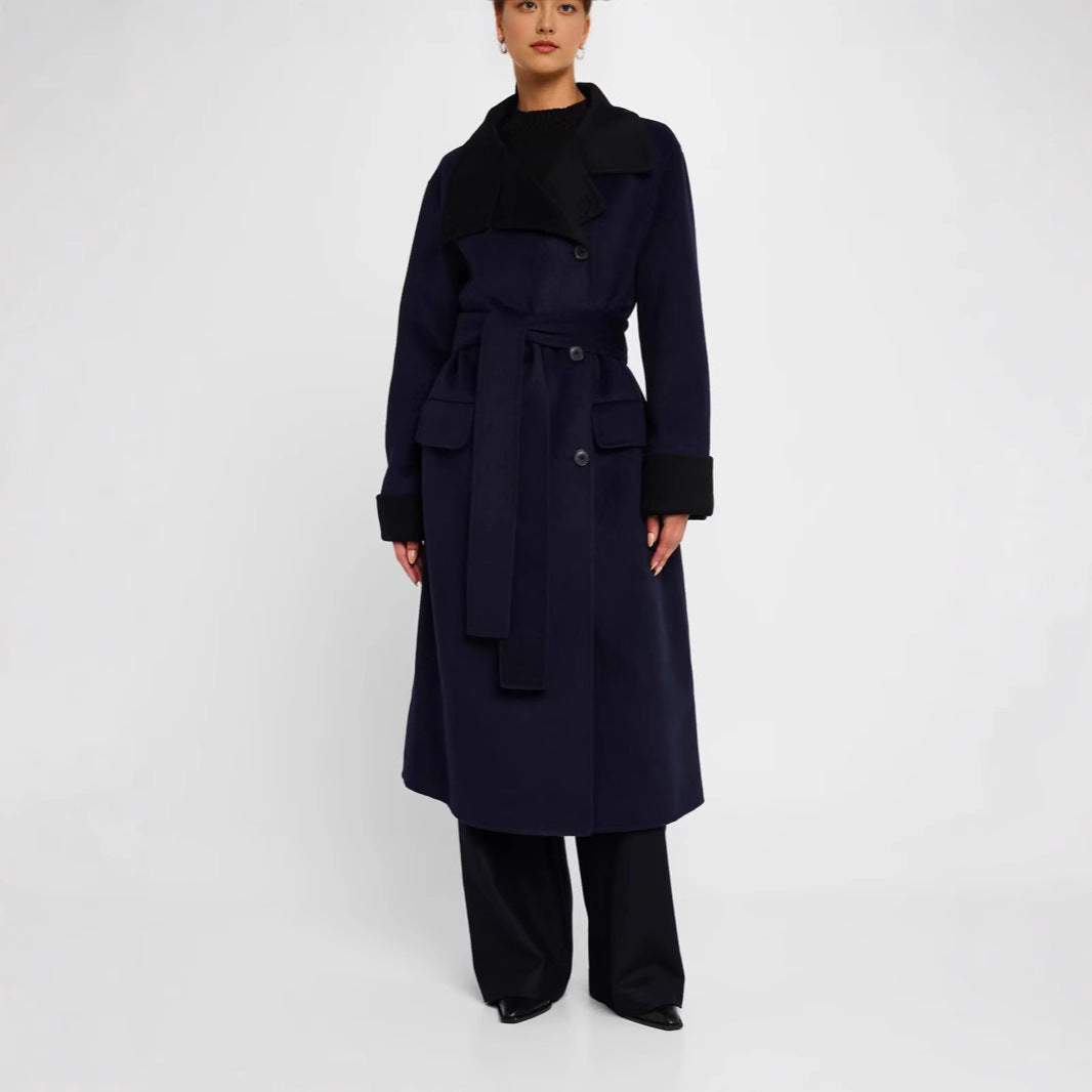 Women's tailored wool blend coat with tie belt, contrast lapel and flap pockets Mune Fashion