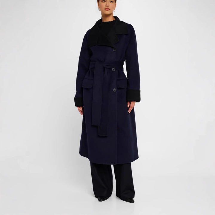 Women's tailored wool blend coat with tie belt, contrast lapel and flap pockets Mune Fashion