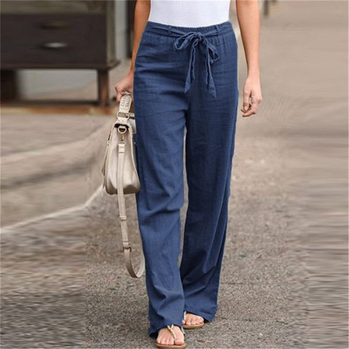 Women's loose linen pants with drawstring waistband, straight leg and side pockets Mune Fashion