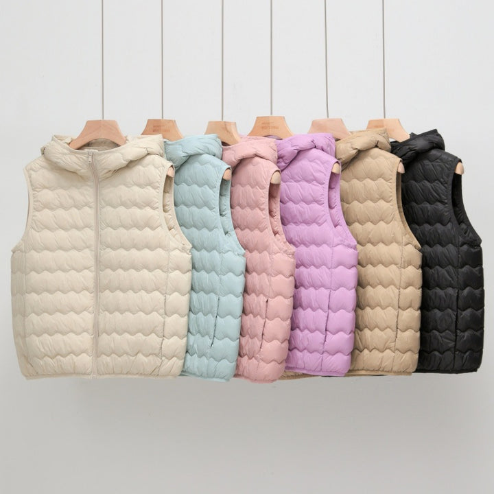 Women Ultra-light Hooded Quilted Vest with Ergonomic Wave Quilting and Compact Packing Format Mune Fashion