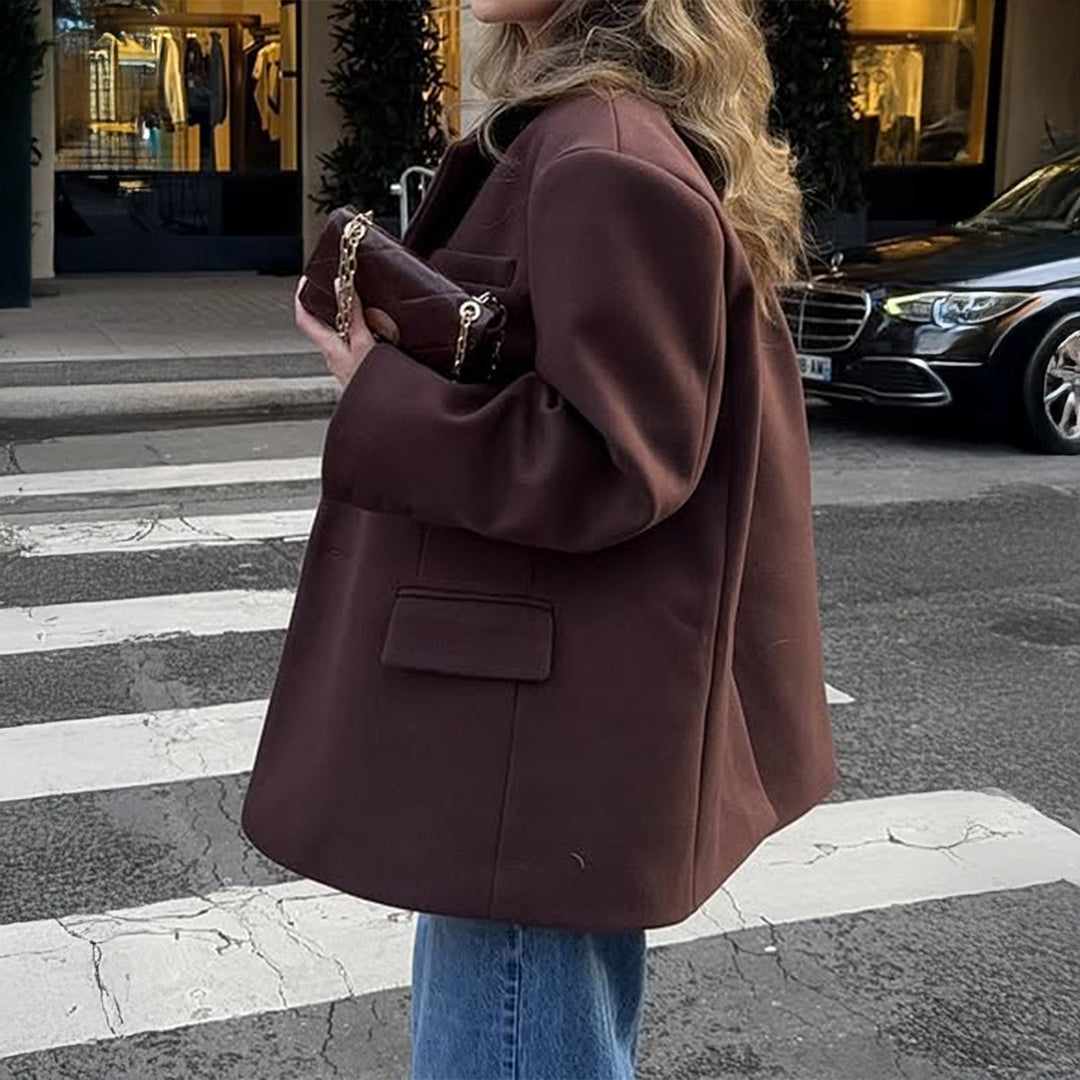 Women's oversized long blazer with boxy cut, notched lapel, padded flap pockets, and textured wool blend Mune Fashion