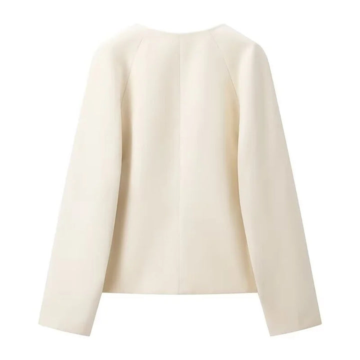 Women's cropped jacket with V-neck, double buckle closure, and boxy silhouette Mune Fashion
