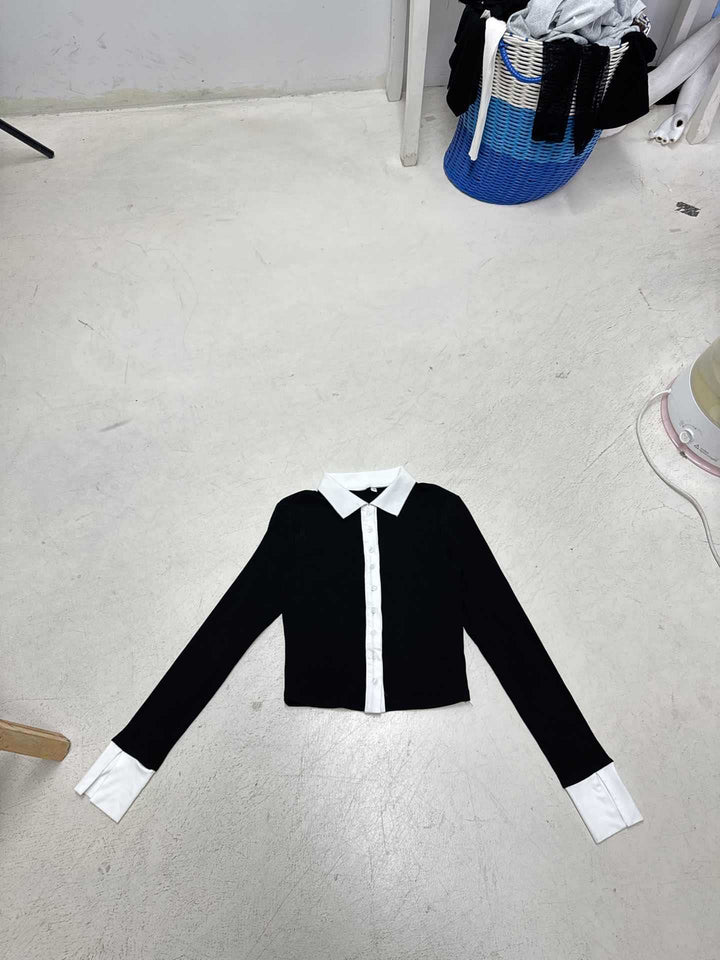 Women's tailored ribbed short cardigan with contrasting collar and extended cuffs Mune Fashion