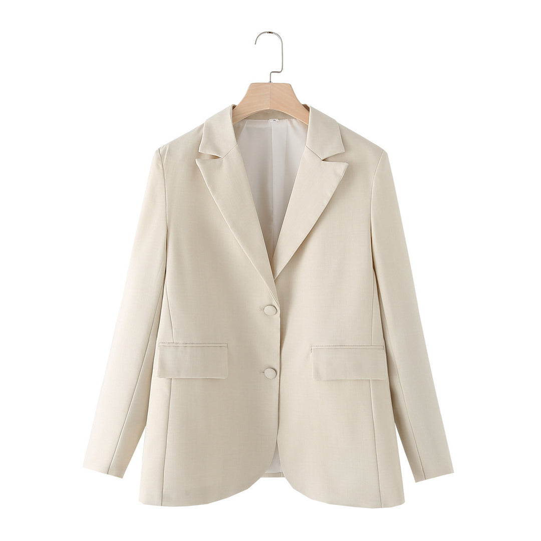 Ladies' three-piece suit set with chain crop top, loose blazer, and high-waisted pleated trousers Mune Fashion