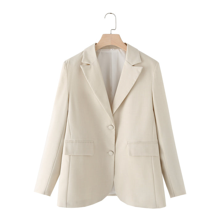 Ladies' three-piece suit set with chain crop top, loose blazer, and high-waisted pleated trousers Mune Fashion