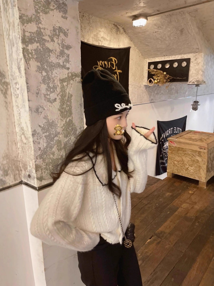 Women's cable knit cardigan with large sailor collar and contrasting edge Mune Fashion