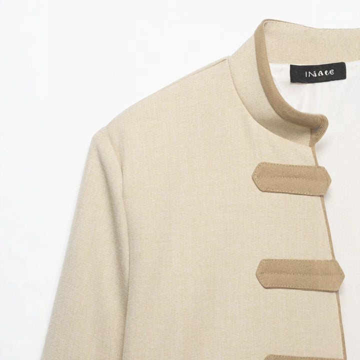 Ladies short jacket in military-inspired style with stand-up collar and decorative straps Mune Fashion