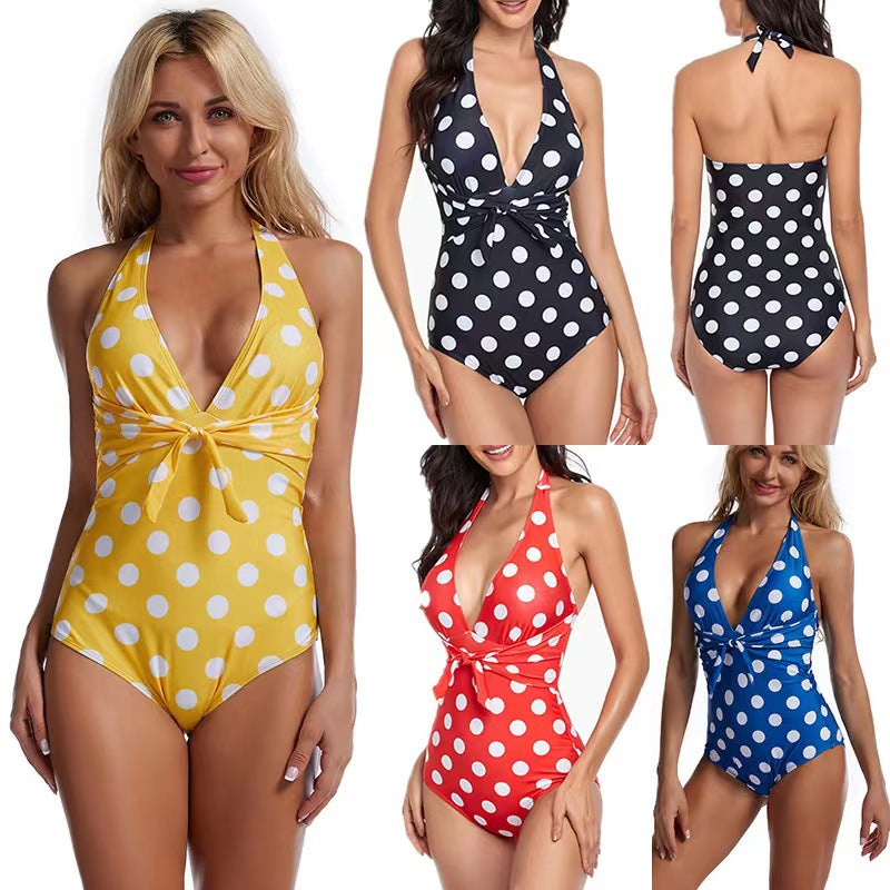 Ladies' one-piece swimsuit with flattering wrap design and stylish polka dots Mune Fashion