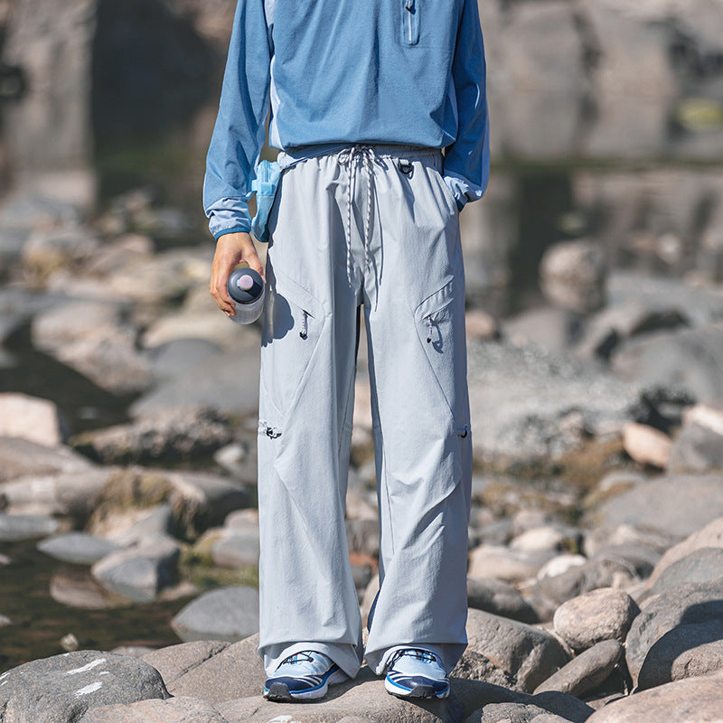 Men's loose technical cargo pants with drawstring, zipper pockets, and adjustable hem Mune Fashion
