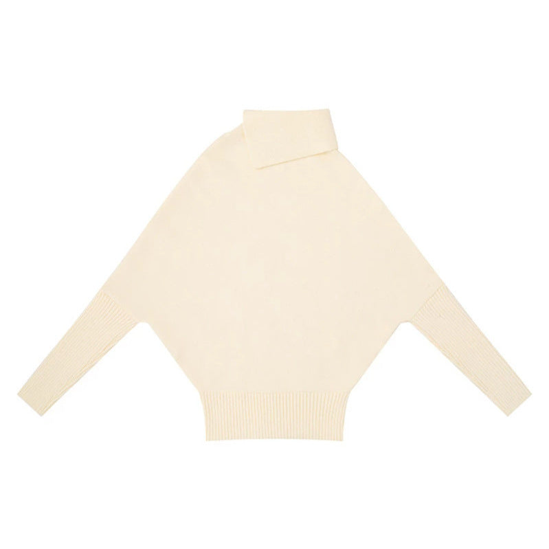 Women's oversized sweater with roll neck, asymmetric shoulder button placket and cable knit details Mune Fashion