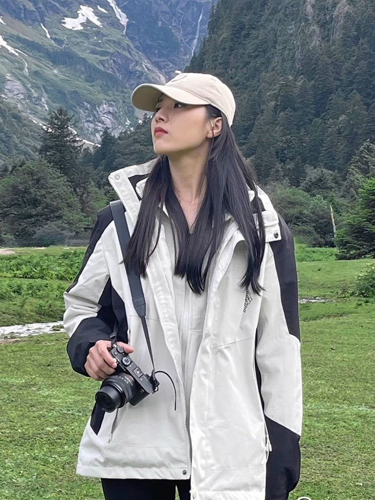 Women's two-layer waterproof outdoor jacket with hood, breathable membrane and adjustable waist Mune Fashion