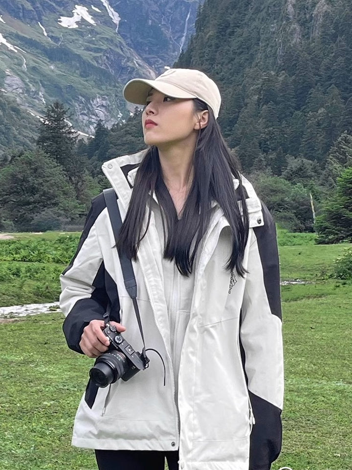 Women's two-layer waterproof outdoor jacket with hood, breathable membrane and adjustable waist Mune Fashion