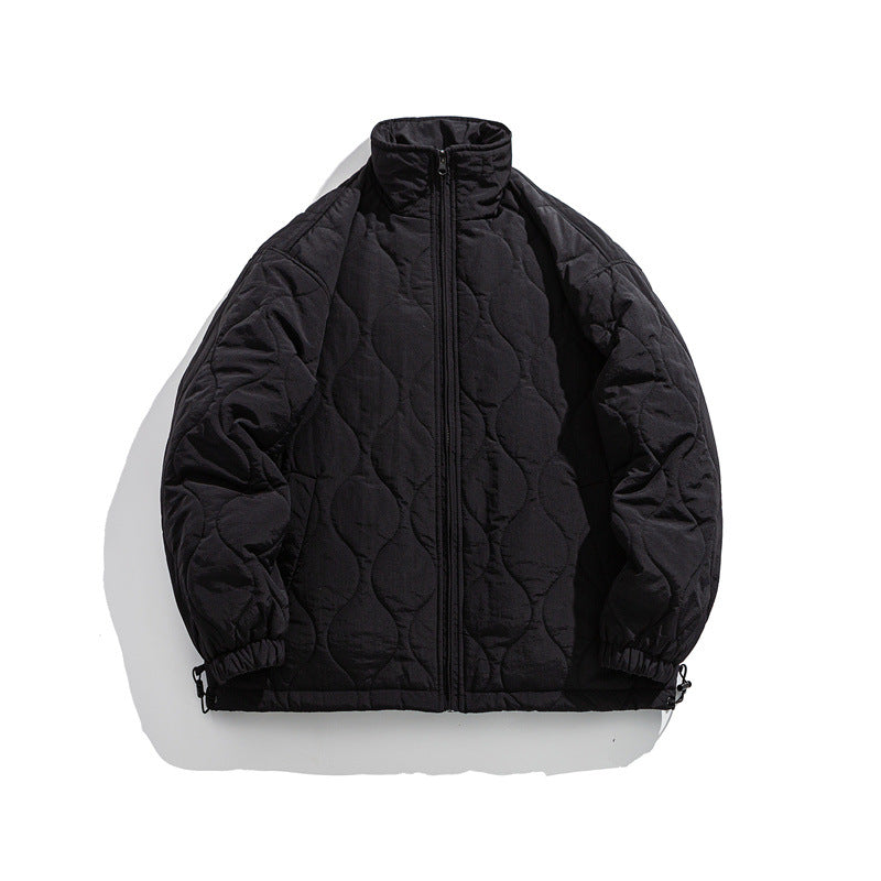 Unisex Boxy quilted jacket in military liner style with high stand-up collar and adjustable hem Mune Fashion