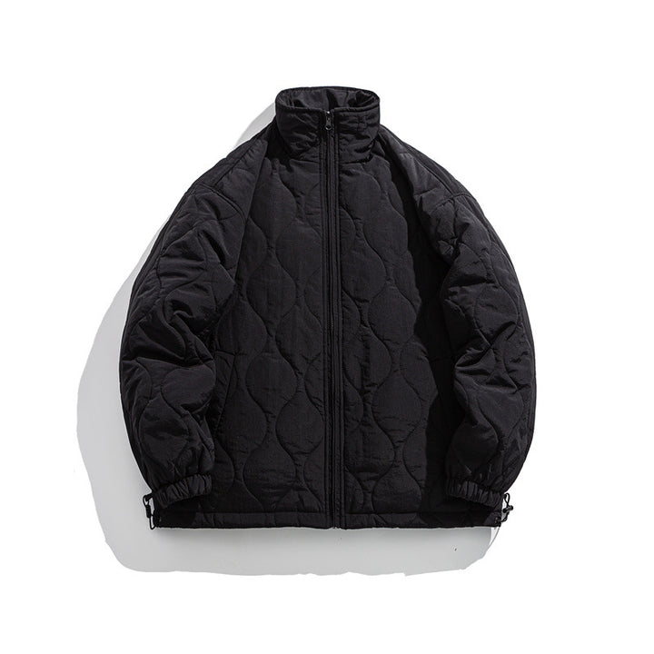 Unisex Boxy quilted jacket in military liner style with high stand-up collar and adjustable hem Mune Fashion