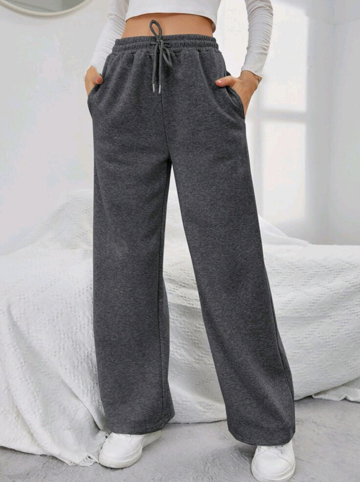 Women's High-Waist Wide-Leg Jogging Pants with elastic comfort waistband, drawstring, and deep side pockets Mune Fashion
