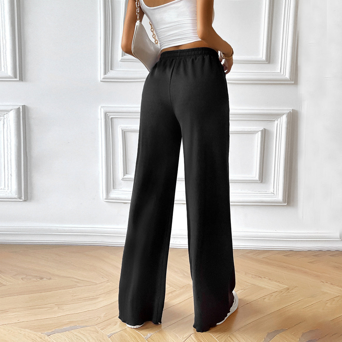 Women's wide lounge pants with elastic waistband, drawstring and side pockets Mune Fashion