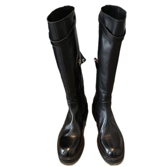 Ladies knee-high leather boots with flat profile sole and decorative strap Mune Fashion