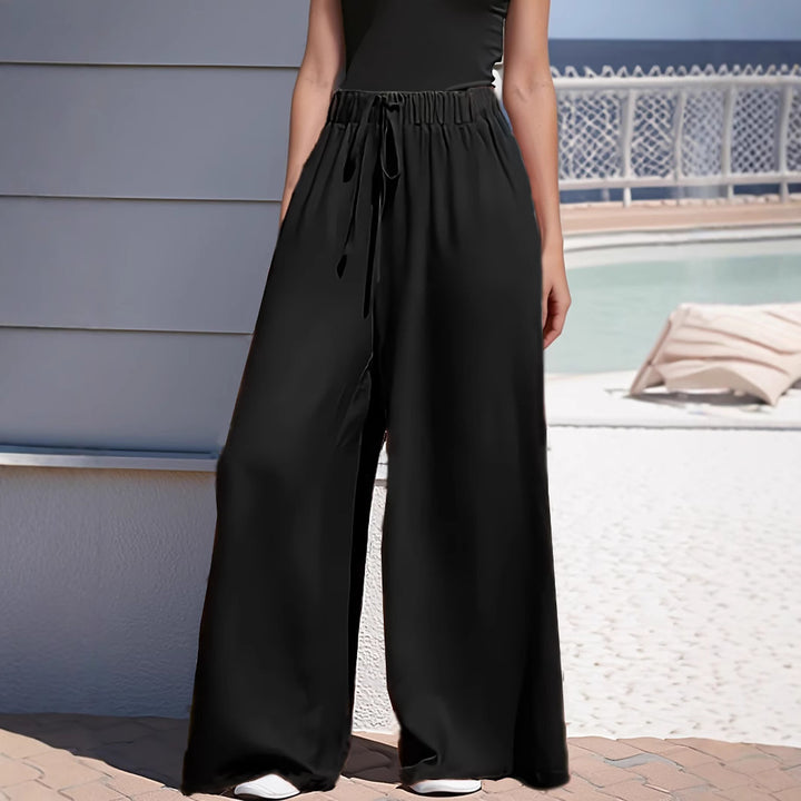 Women's wide Palazzo pants with high paperbag waistband, elastic drawstring, and front leg slit Mune Fashion