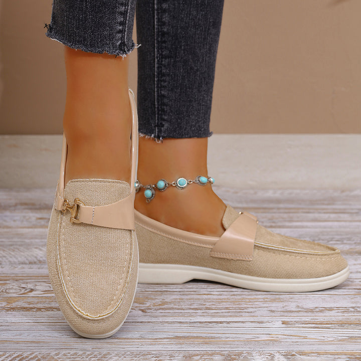 Ladies elegant suede slippers with decorative metal hardware and flexible easy-running sole Mune Fashion