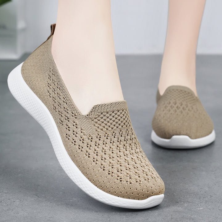 Women’s seamless knit slip-on with perforated air mesh structure, ergonomic memory footbed, and lightweight EVA cushioning Mune Fashion