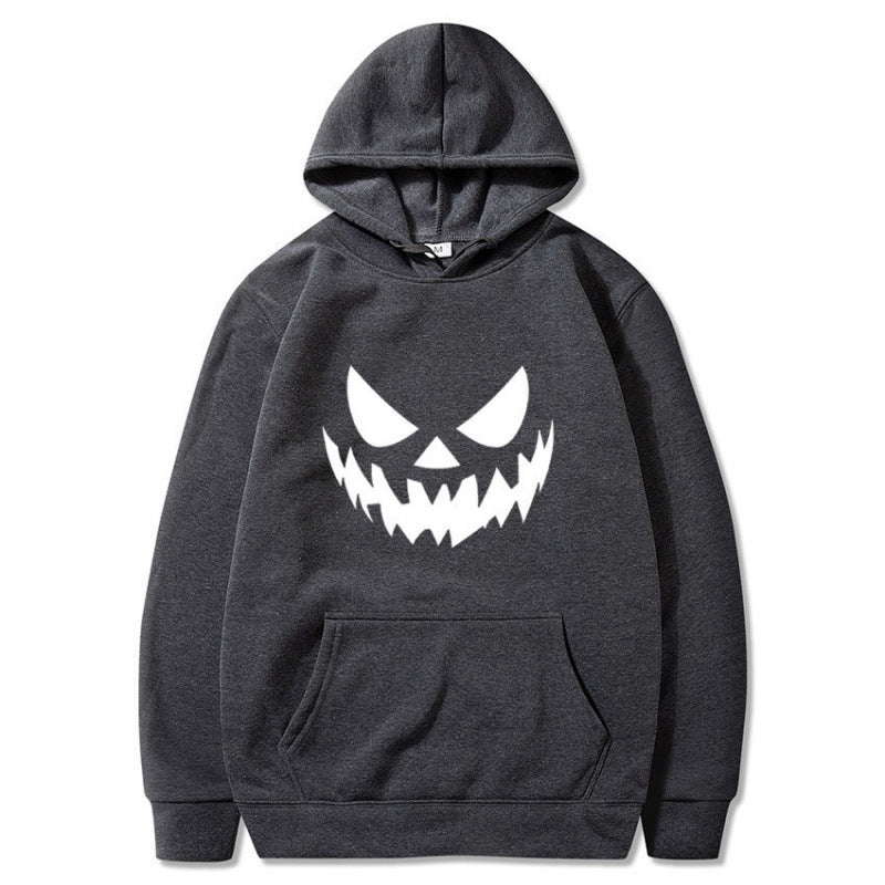 Unisex hooded sweatshirt with creepy pumpkin face print and oversized kangaroo pocket Mune Fashion