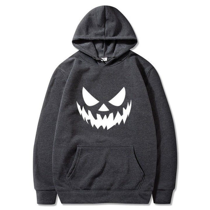 Unisex hooded sweatshirt with creepy pumpkin face print and oversized kangaroo pocket Mune Fashion