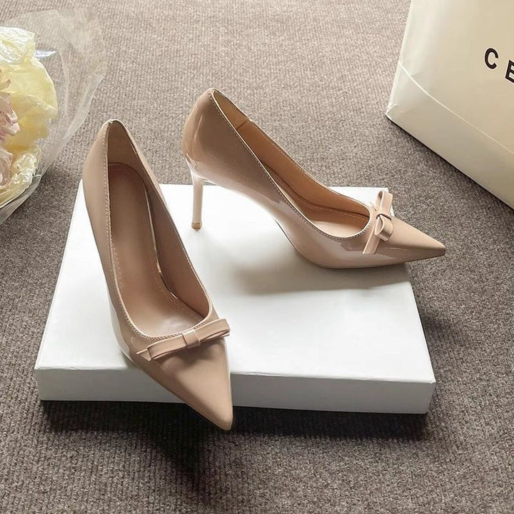 Women’s pointed toe patent pumps with decorative bow and slim stiletto heel Mune Fashion