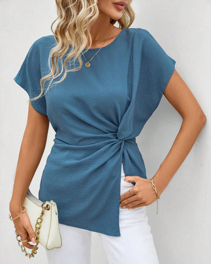Women's fitted short sleeve draped shirt with side knot sling and textured crepe look Mune Fashion