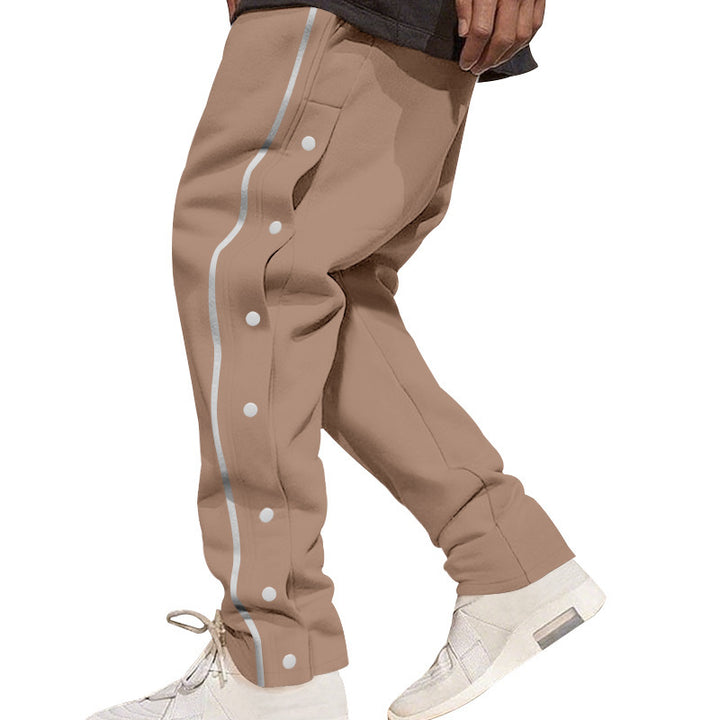Men's loose track pants with side snap button placket, elastic waistband, and reflective streamline stripe Mune Fashion