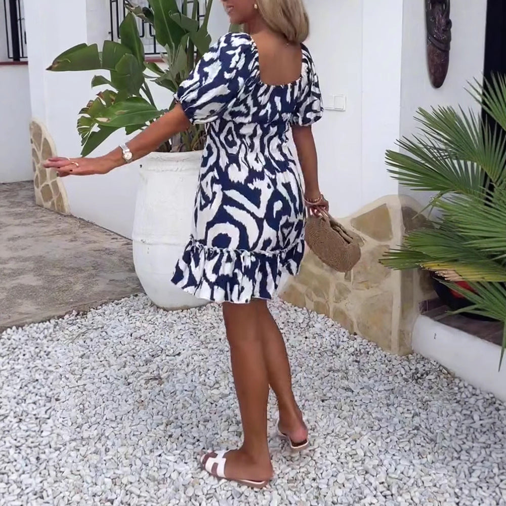 Women's short summer dress with square neckline, puff sleeves, and ruffle hem Mune Fashion