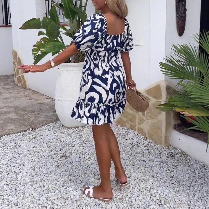 Women's short summer dress with square neckline, puff sleeves, and ruffle hem Mune Fashion