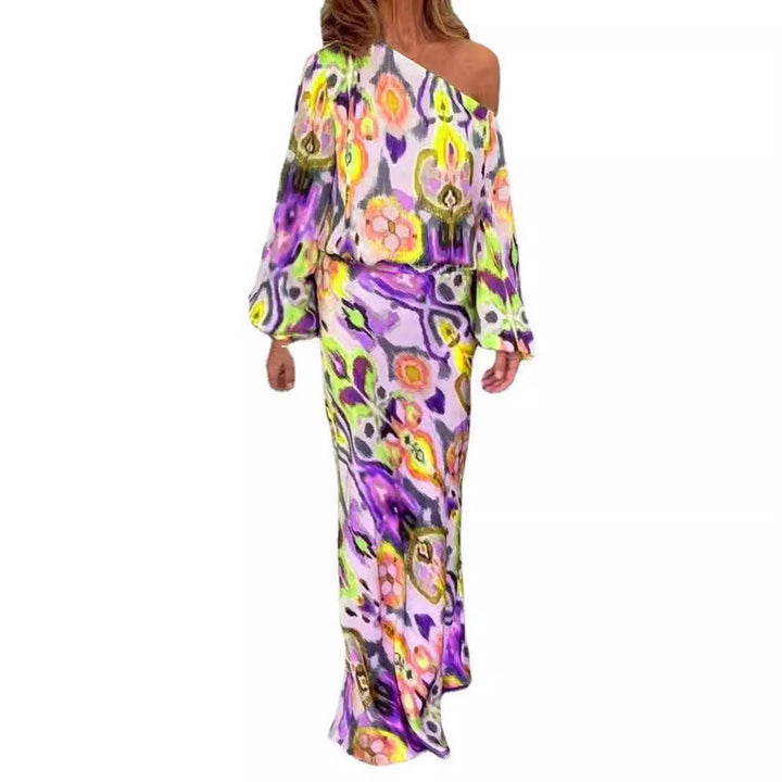 Women’s maxi dress with asymmetric one-shoulder, wide trumpet sleeves, and flowing satin print.