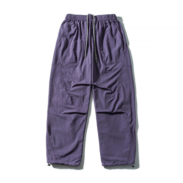 Unisex Loose-fitting outdoor pants with elastic waistband, drawstring, and adjustable leg cuffs Mune Fashion