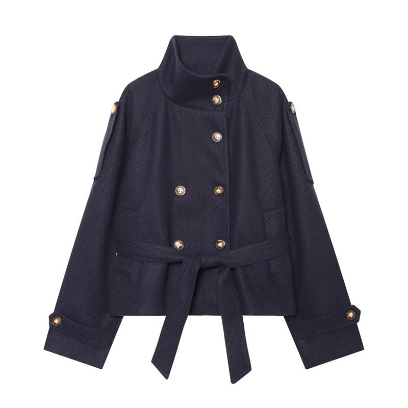 Women's short jacket in boxy cut with high standing collar, waist belt and decorative button placket Mune Fashion
