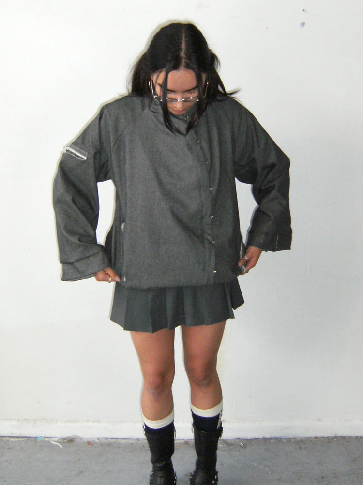 Women’s oversized boxy jacket with asymmetric button closure and arm pocket Mune Fashion