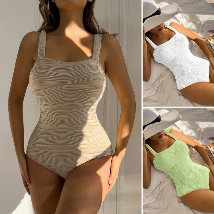 Women's figure-fitting one-piece swimsuit with playful bow details Mune Fashion