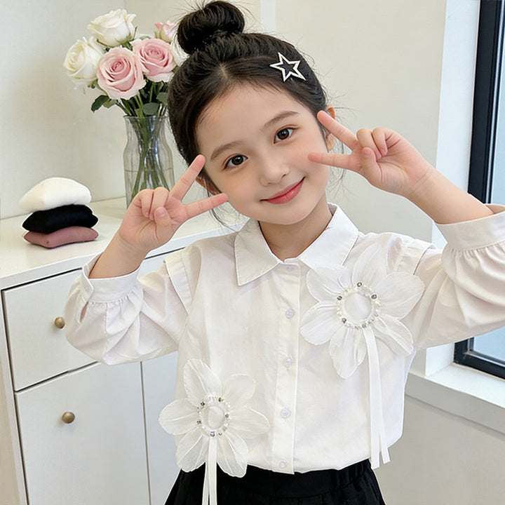 Girl's blouse with floral appliqués and elegant ruffle details Mune Fashion