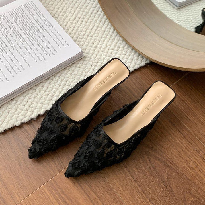 Women's pointed toe mesh mules with three-dimensional floral appliqués and padded comfort footbed Mune Fashion