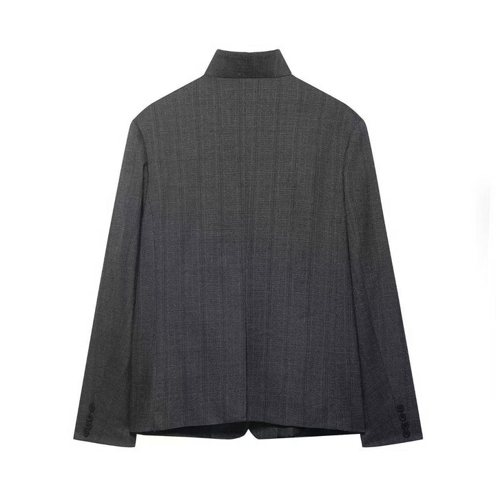 Women's short blazer with stand-up collar, asymmetric button placket and flap pockets Mune Fashion
