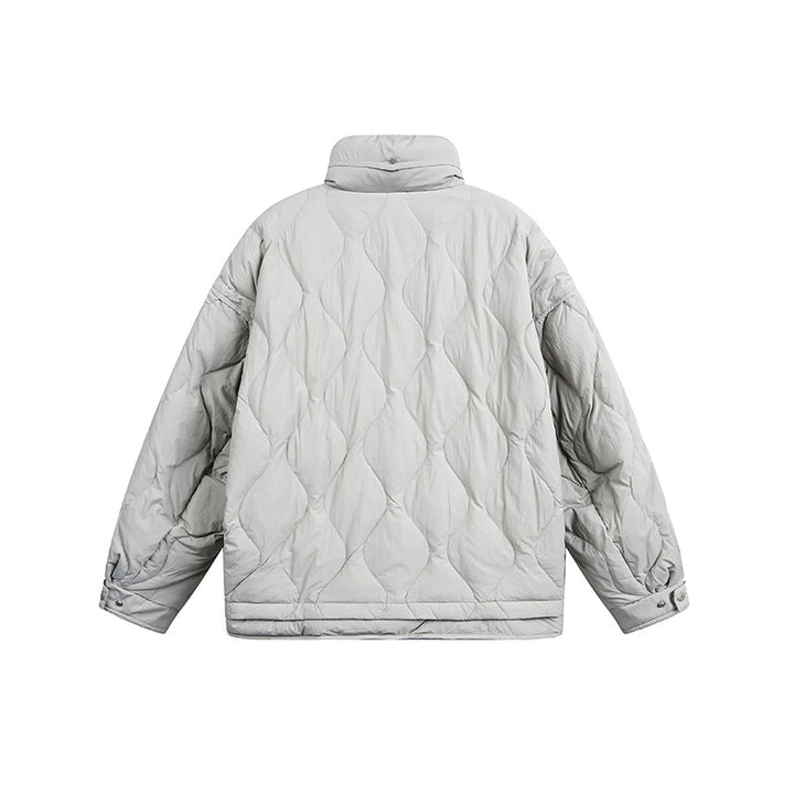 Women's oversized quilted jacket with stand-up collar, wave quilting, and drawstring hood