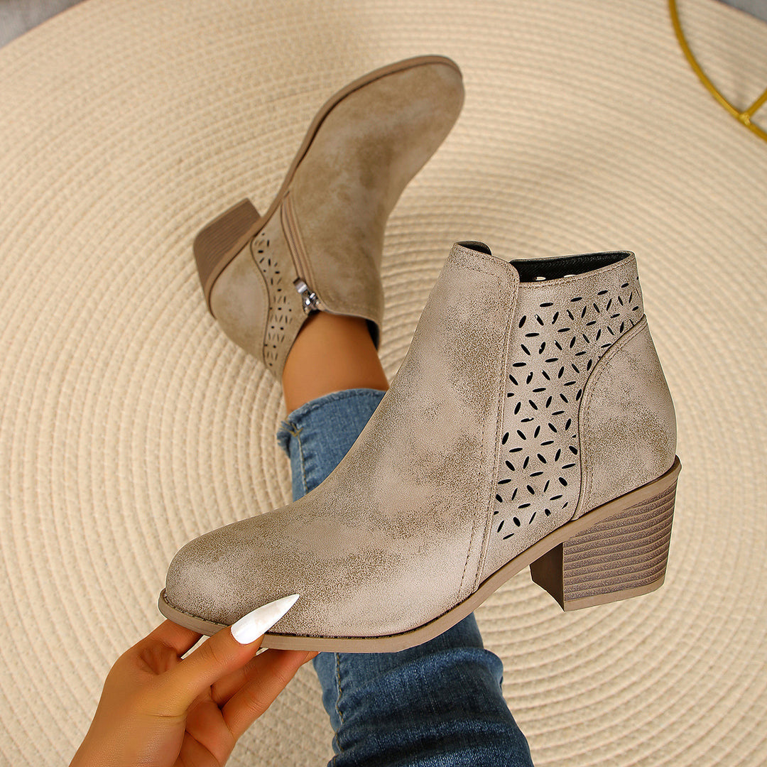 Women's ankle-high ankle boots with laser-cut perforation, side zipper, and mid-high block heel Mune Fashion