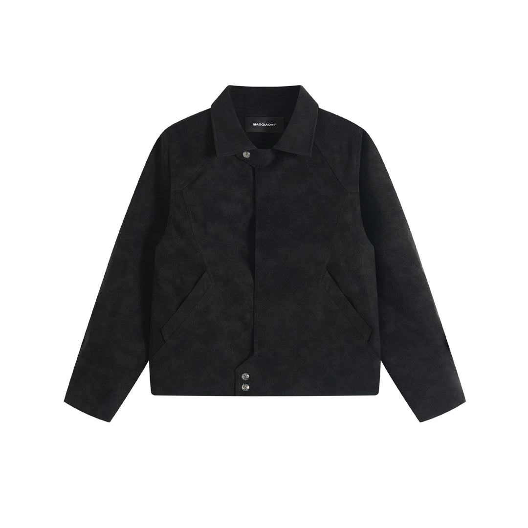 Men's short jacket in suede look with asymmetric front flap and geometric flap pockets.